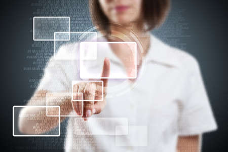 Young woman hand pressing digital button の写真素材