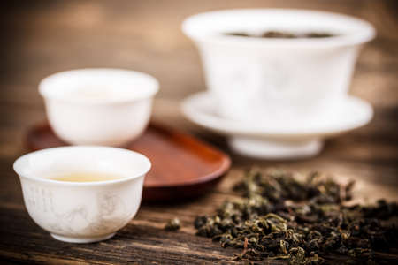  White gaiwan on old wooden tableの写真素材