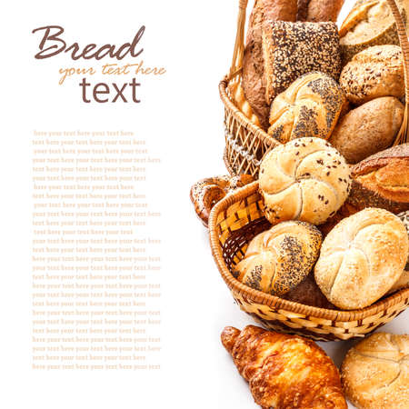 Composition with bread and rolls on white の写真素材