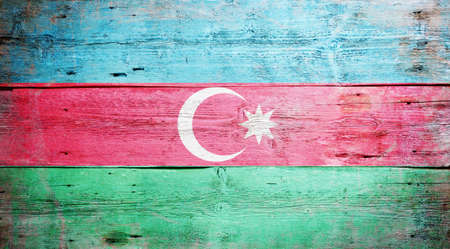 Flag of Azerbaijanpainted on grungy wood plank background の写真素材