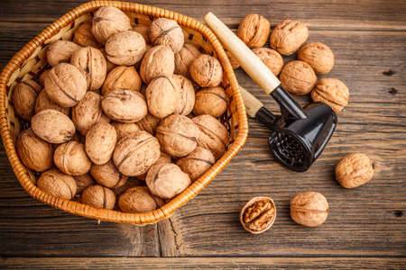Walnuts fruit on wood background texture 