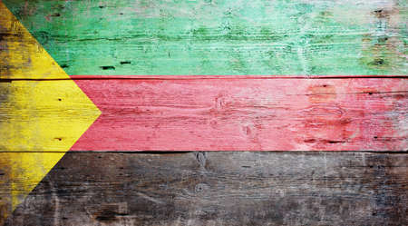 Flag of Azawad painted on grungy wood plank backgroundの写真素材