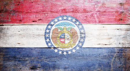 Flag of Missouri painted on grungy wooden backgroundの写真素材