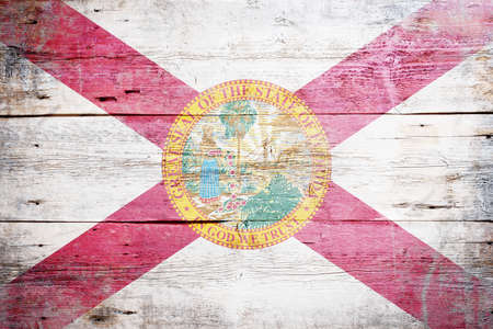 Flag of Florida painted on grungy wooden backgroundの写真素材
