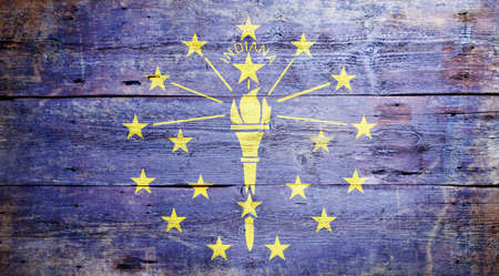 Flag of Indiana painted on grungy wooden backgroundの写真素材