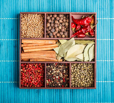 Various spices in wooden boxの写真素材