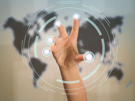 Scanning of finger on a touch screen interface の写真素材