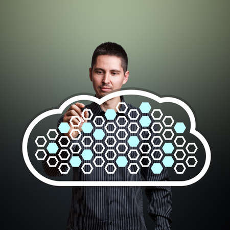Man completing fields in cloud computing diagram