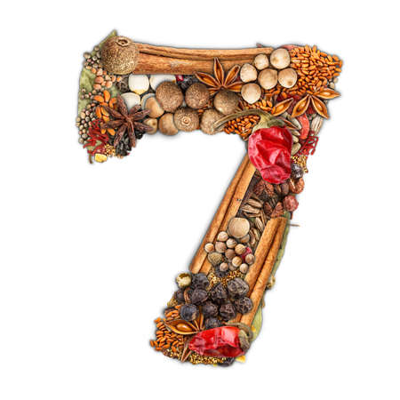 Number 7 made of spices isolated on white background の写真素材