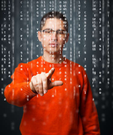 Business man touching at code listの写真素材