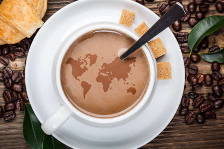 World map in coffee cupの写真素材