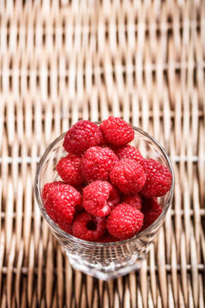 Fresh raspberries in the glass