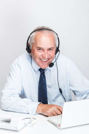 Customer service agent working in officeの写真素材