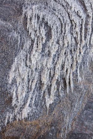 Salt on wall of salty mine, Turda, Romania