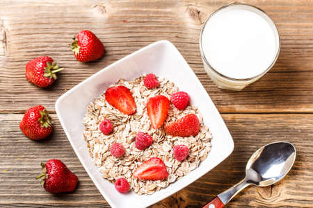 Museli with summer berries and milkの写真素材