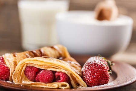 Closeup of a pancake with fruit の写真素材