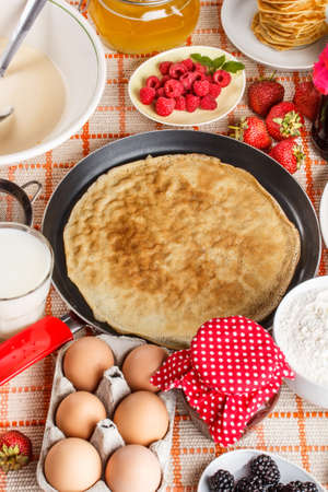 Still life on kitchen table with pancake