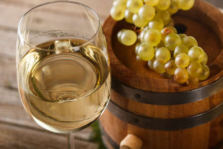 Still life with wine glass and barrelの写真素材