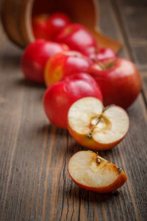 Red apples on wooden boardの写真素材