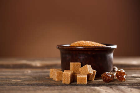 Brown sugar cubes and candy sugar sticksの写真素材