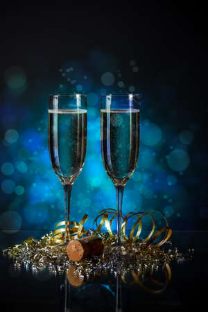 New Year champagne concept on blue backgroundの写真素材
