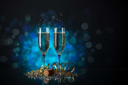 Pair glass of champagne with clipping path on blue backgroundの写真素材