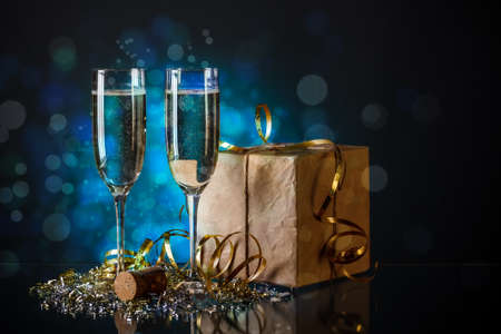 Two champagne glasses ready to bring in the New Year の写真素材