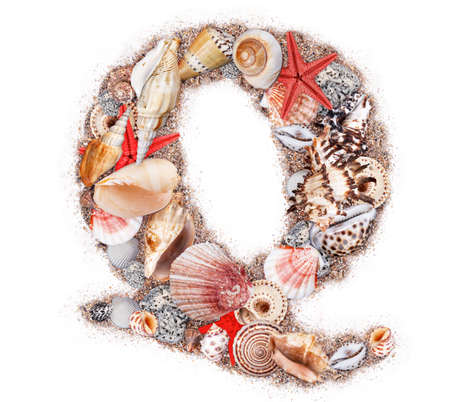 Letter Q made of seashell isolated on white backgroundの写真素材