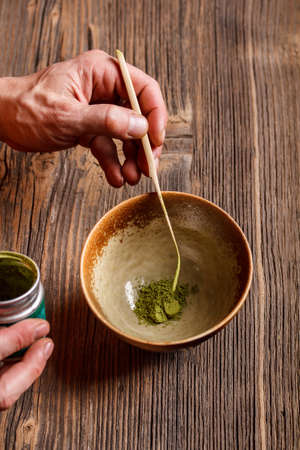 Japanese tea ceremony, matcha tea in ceramic bowl 