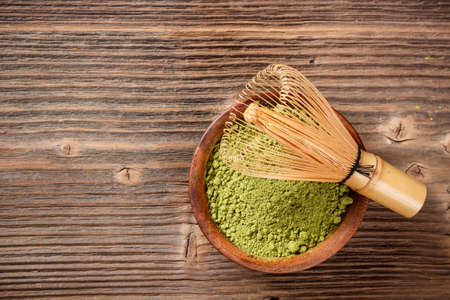 Matcha, dried powder green tea with space for textの写真素材