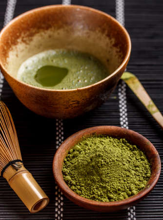 Matcha tea in ceramic bowlの写真素材