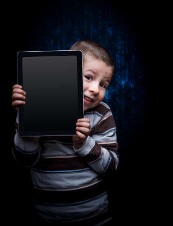 Cute kid with tablet, keekの写真素材