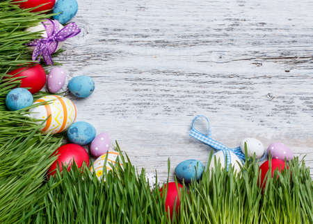 Easter frame with eggs and grass