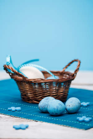Easter concept with blue quail eggsの写真素材