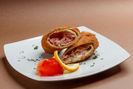 Rolled pancakes stuffed ham and cheese