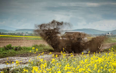 car in mud and dirt splash 