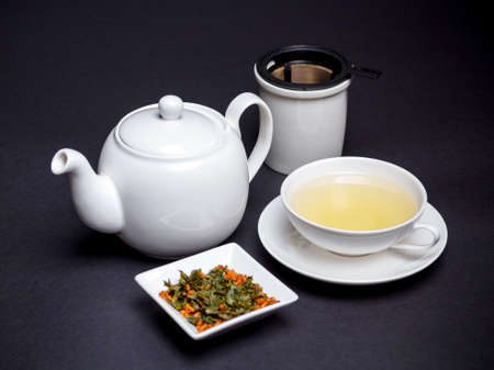 Cup of green tea with toasted rice の写真素材
