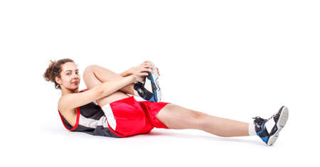 Basketball woman getting warmed up against a white background