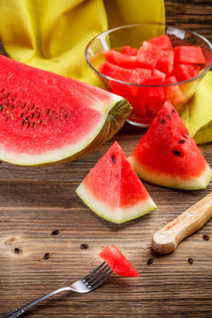 Watermelon composition on wooden tableの写真素材