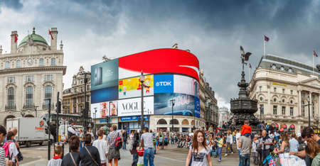 People visit Piccadilly Circus on August 13, 2014 in London.のeditorial素材