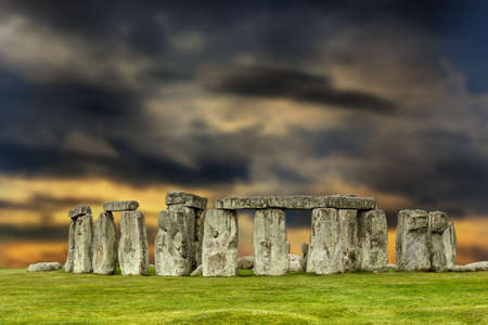 Stonehenge at sunset with apocalyptic sky, United Kingdomの写真素材