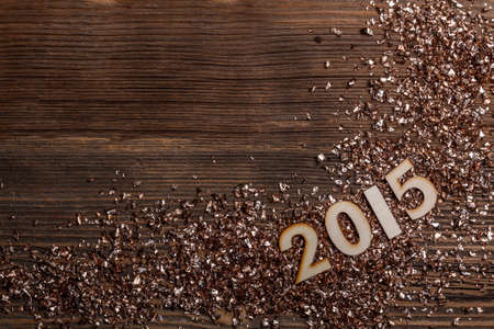 Wooden numbers forming 2015 on a rustic wooden suface の写真素材