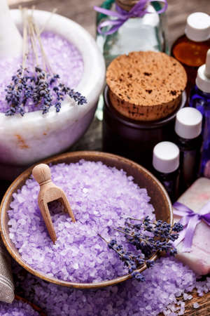 Dried lavender flowers with a bottle of essential oilの写真素材