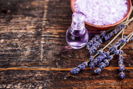 Lavender perfume on wooden tableの写真素材