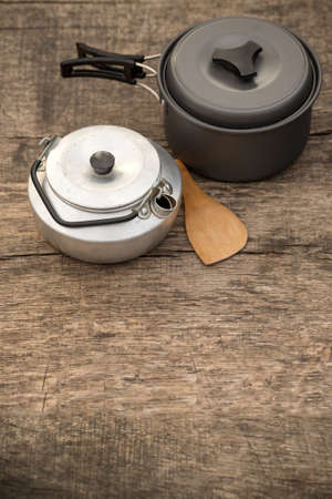 Camping pot for mountain camping on wooden backgroundの写真素材