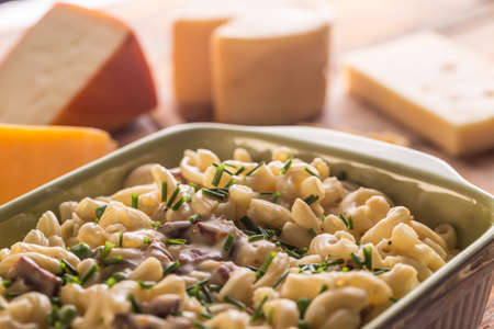 Baked macaroni and cheese in baking dishの写真素材