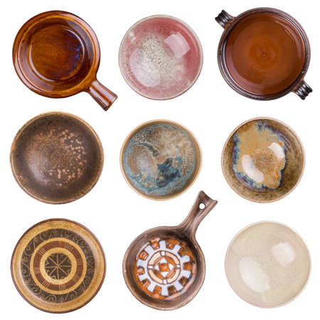 Collection of empty bowls on the white backgroundの写真素材
