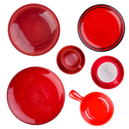 Set of red round plates or dishes isolated on whiteの写真素材