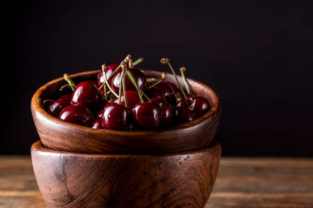 Fresh sour cherry in a bowlの写真素材