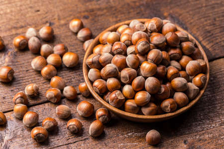 Hazelnuts in a wooden bowl